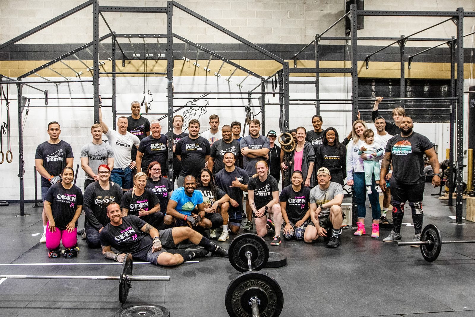 The Grounded CrossFit community gathered on the gym floor under the rig